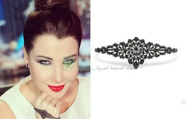 صور نانسي عجرم لا بسه اسوار ذهب اسود ب 10 الاف دولار