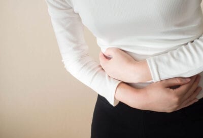 When do periods start again after an abortion?