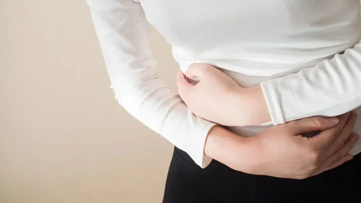 When do periods start again after an abortion?
